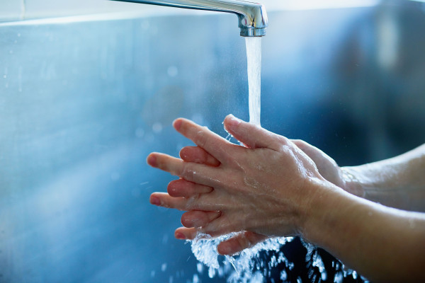 a person practicing good travel hygiene